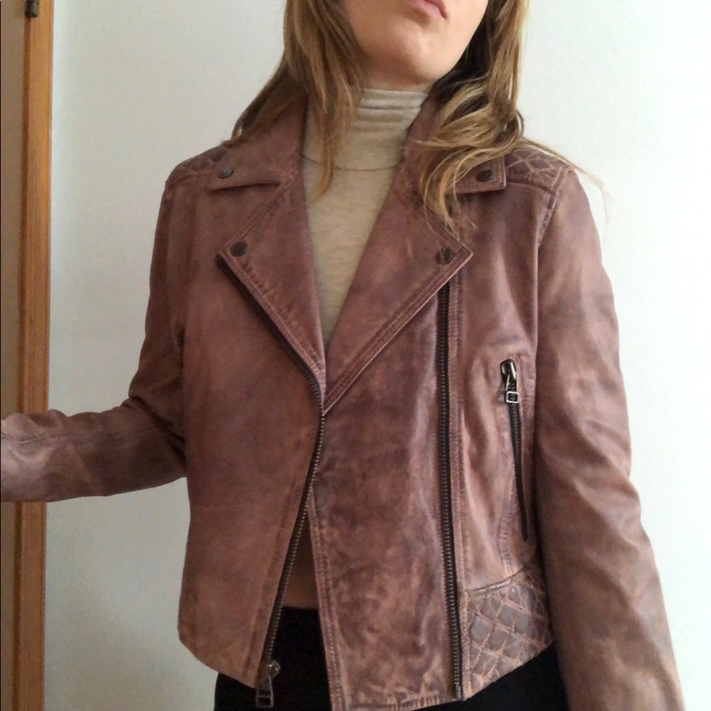Andrew Marc distresses leather jacket